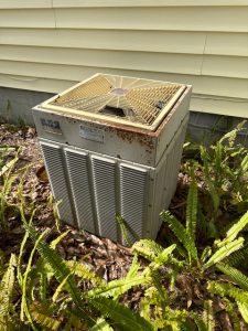 Old residential air conditioning condenser unit