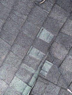 Asphalt shing roof with missing tabs