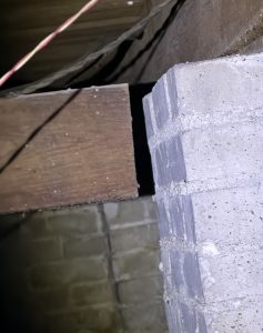 Unsupported structural beam in residential crawl space